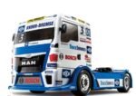 Hahn-tastic!!! This is an exciting R/C model assembly kit recreating the Team Hahn Racing MAN TGS truck which stars on the truck racing circuit in Europe. The realistic body is a 4-piece set made from lightweight and durable polycarbonate, with separately molded plastic side mirrors, coupler and rear bumper parts. The TT-01 Type-E chassis is a proven performer, and here is fitted with dedicated new wheels and tires for the model.
